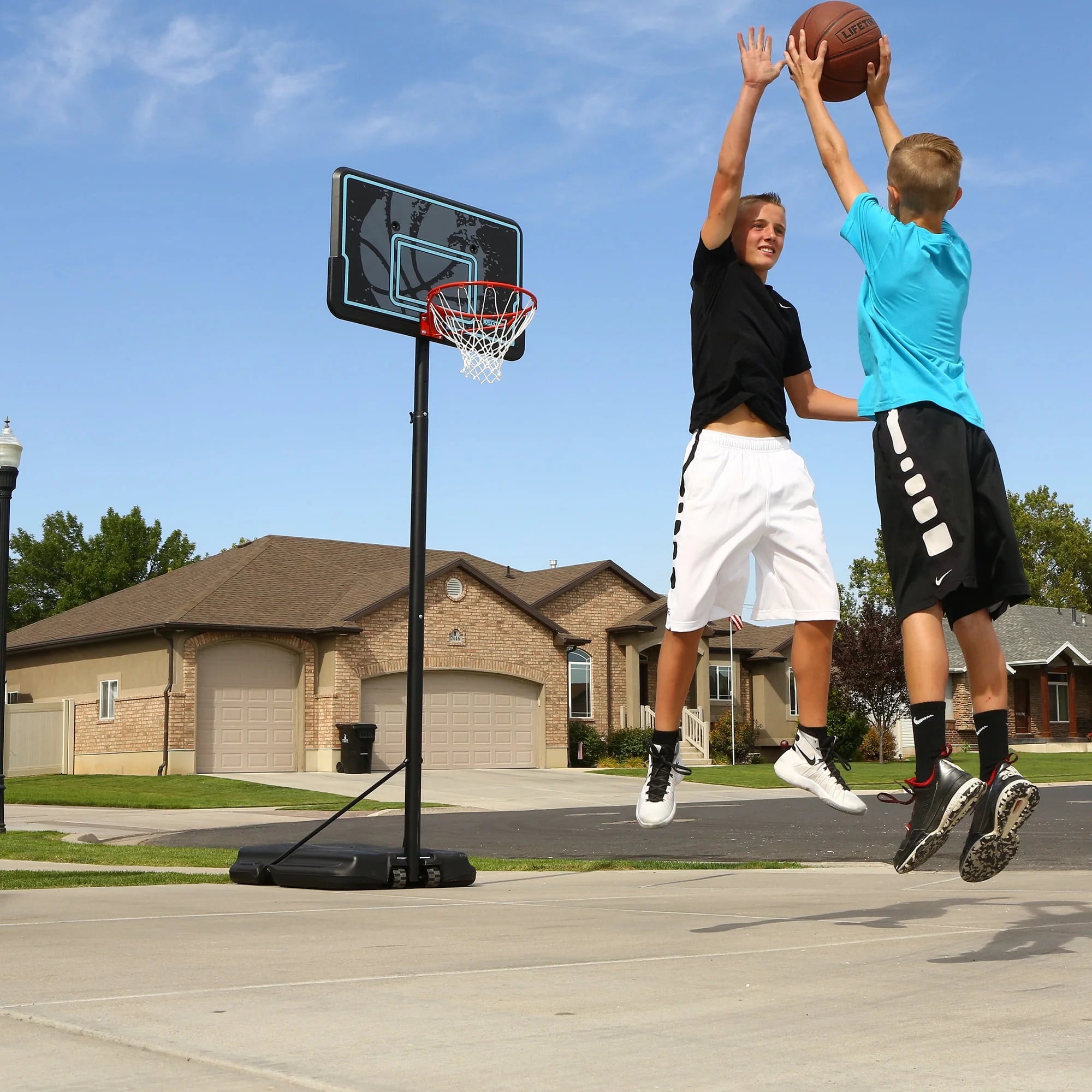 Lifetime Adjustable Portable Basketball Hoop, 44 inch HDPE Plastic Impact W285